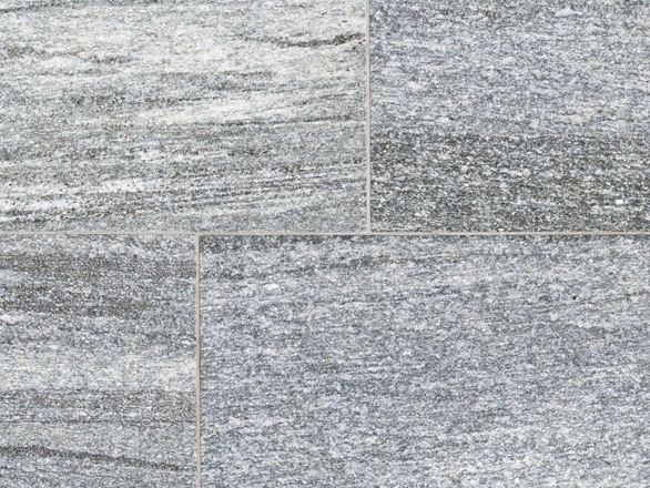 Zbliżenie na szare płyty granitowe z serii Urban Grey Line